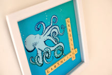 Load image into Gallery viewer, Blue Octopus illustration with &quot;Greetings Earthlings&quot; written in scrabble tiles 
